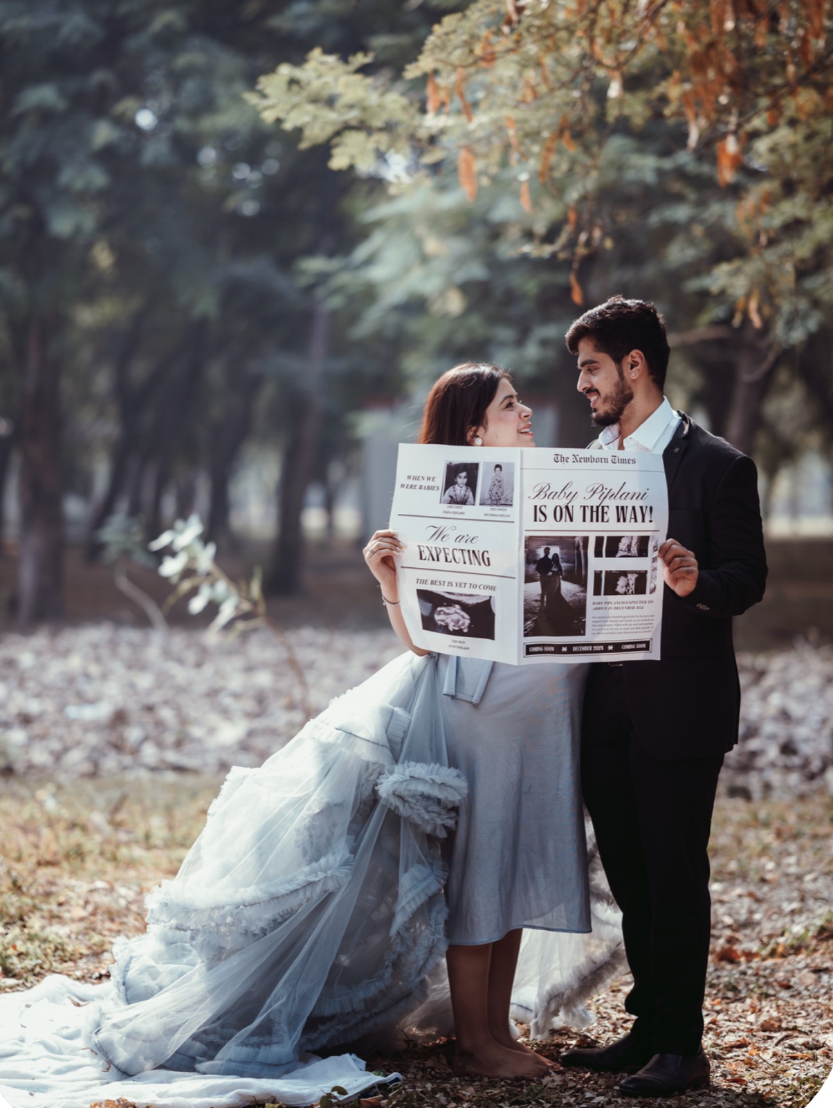 Silver maternity outdoor couple newspaper pregnancy announcement photoshoot